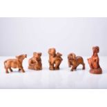 A group of five Japanese wood netsuke modelled as animals, 20th century