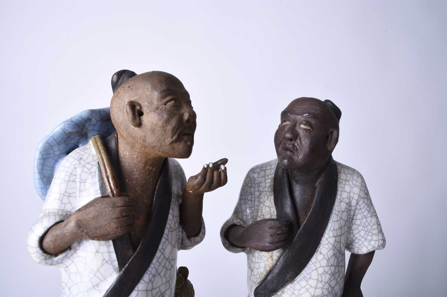 A Chinese pair of Shiwan 'mud' figures, 20th century - Image 2 of 5