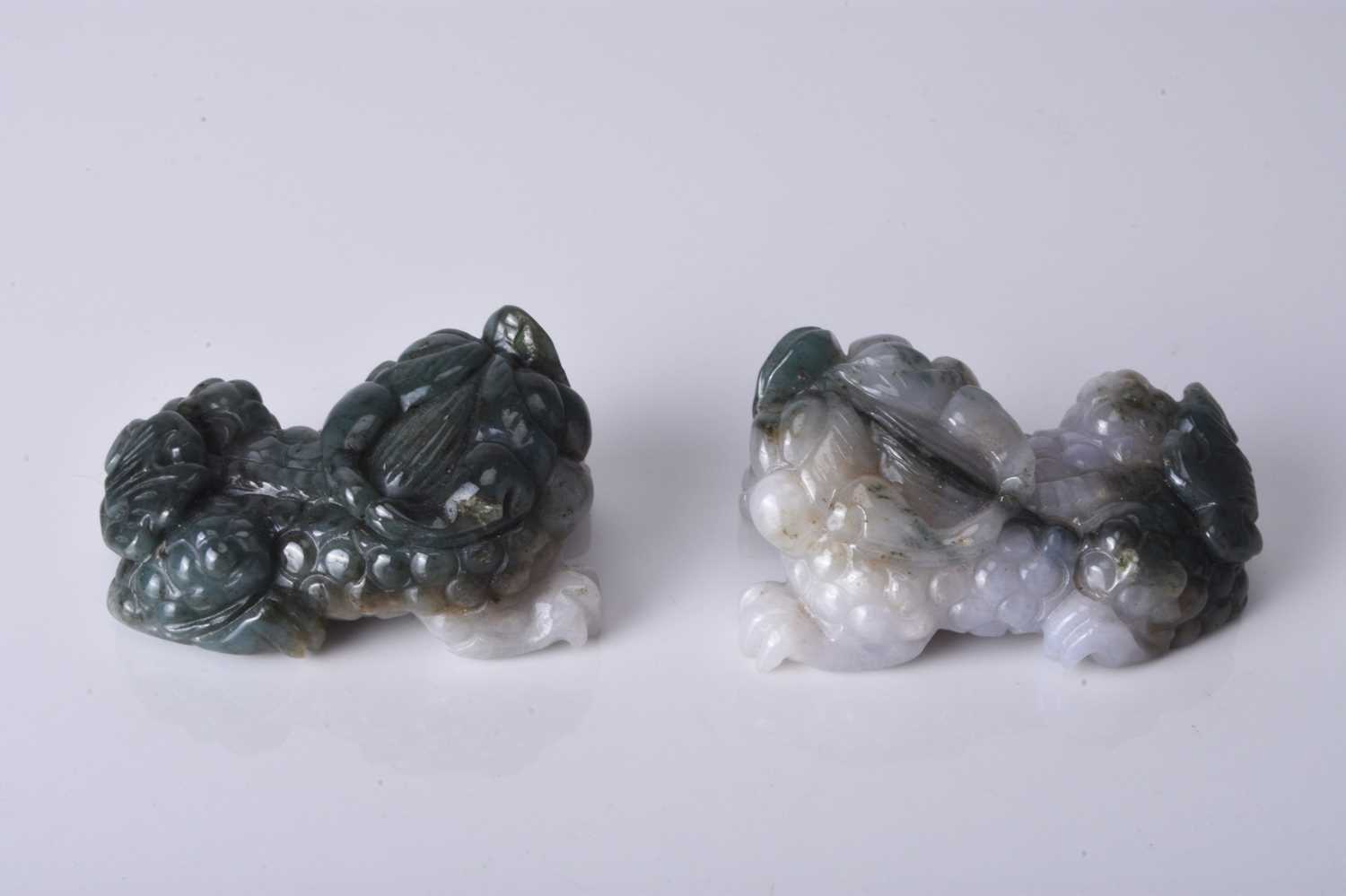 A pair of Chinese jadeite figures of lion dogs, 20th century - Image 3 of 3