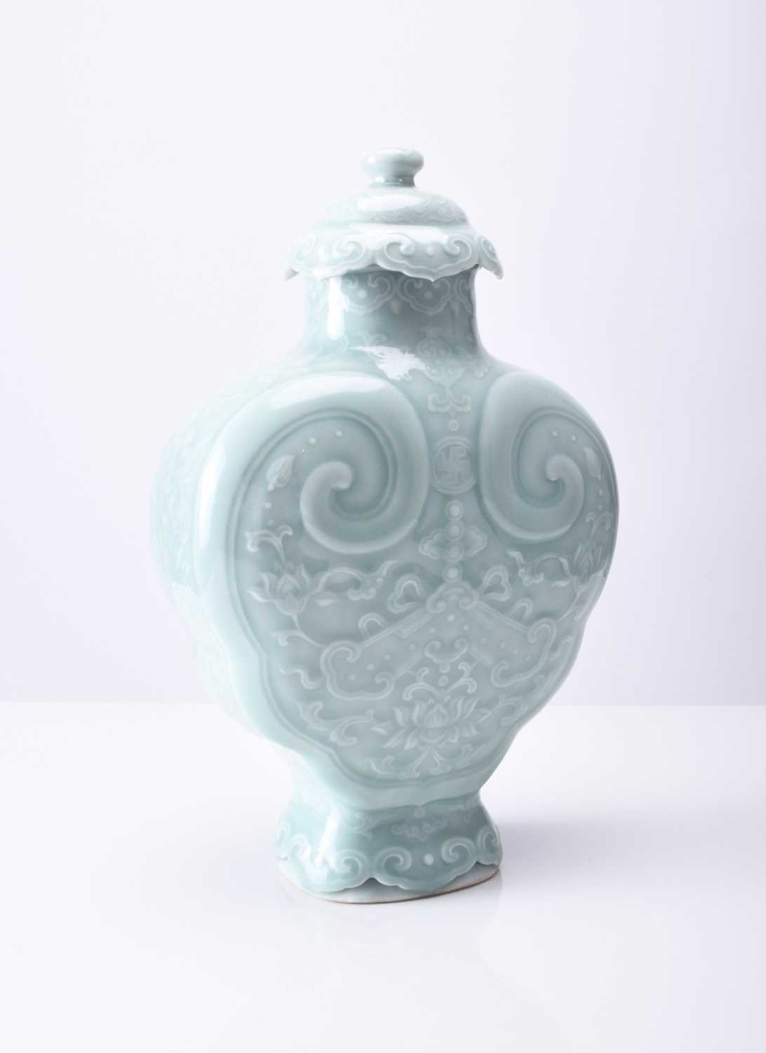 A Chinese carved celadon-glazed Ruyi vase and cover, Qianlong seal mark - Image 2 of 12