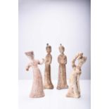 Four Chinese pottery figures of maidens, Tang Dynasty