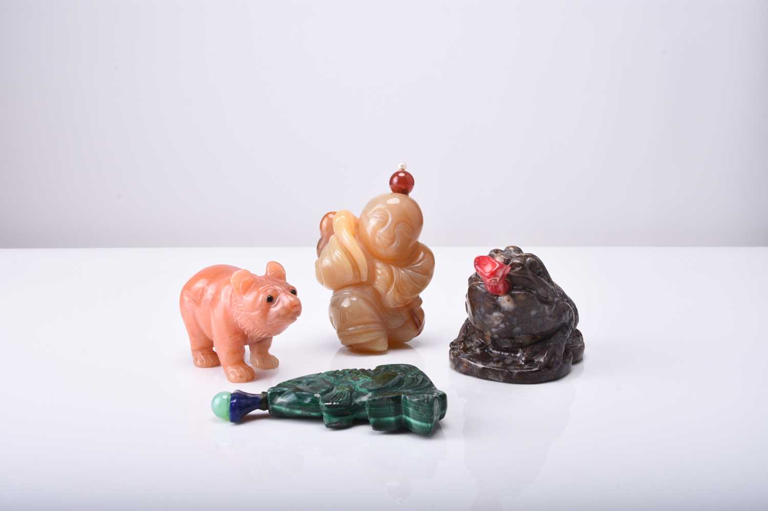 Four Chinese hardstone figural snuff bottles, 19th/20th century