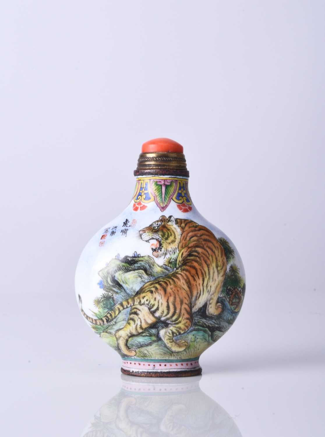 A Chinese Beijing enamel snuff bottle, Qianlong mark