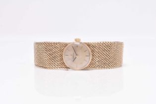 Omega: A lady's 9ct gold bracelet watch