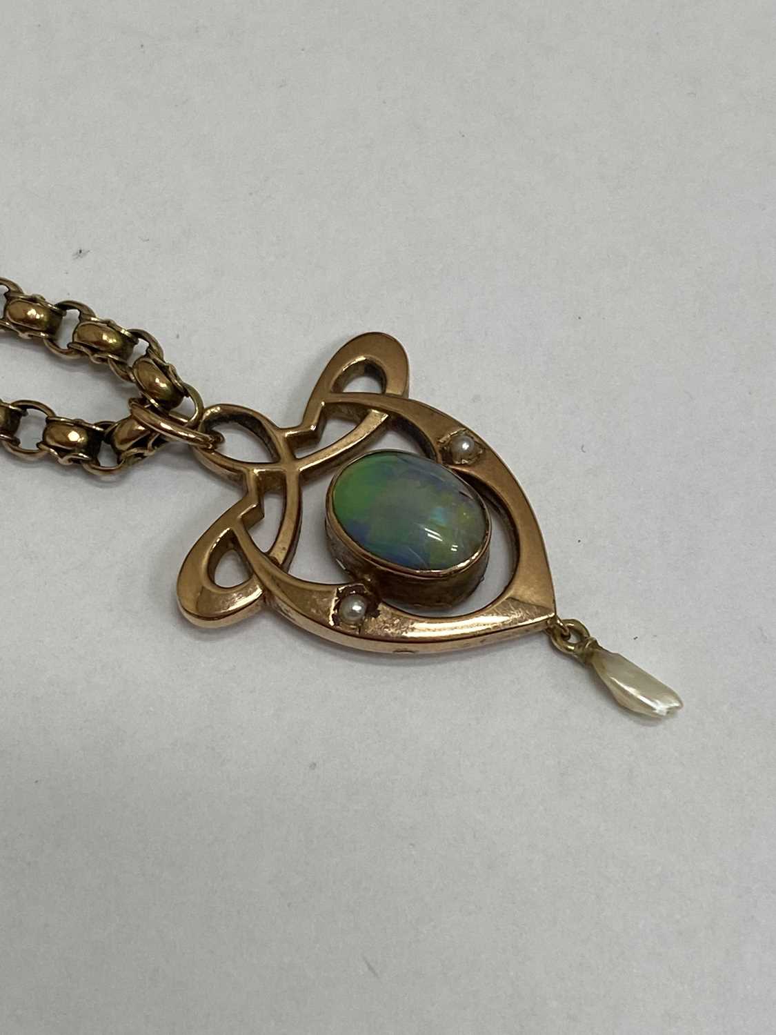 An Arts and Crafts opal pendant on chain - Image 7 of 11