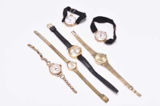 A group of lady's gold and gold plated wristwatches