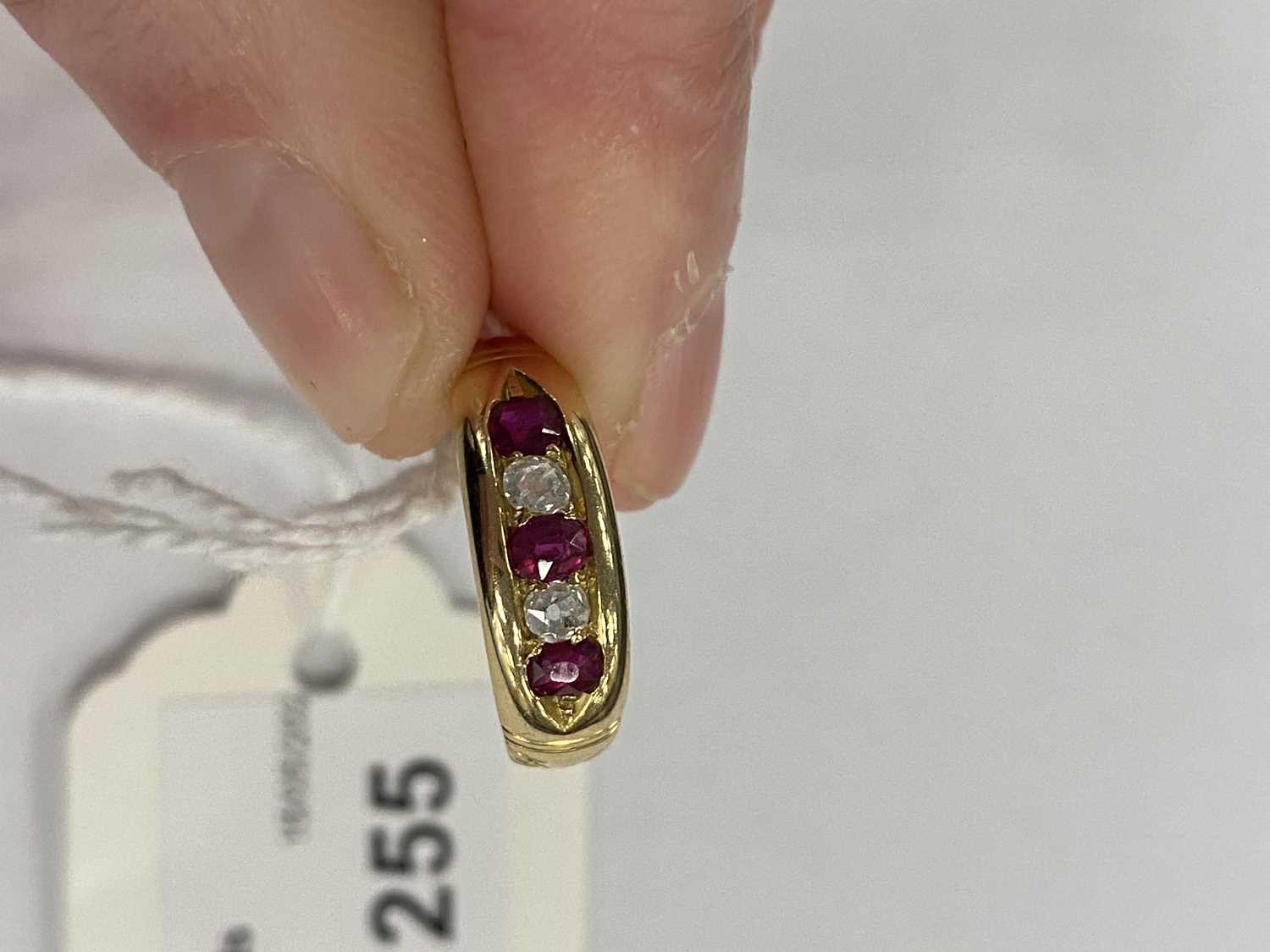 A graduated five stone diamond and untested ruby ring - Image 7 of 8