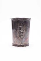 A white metal beaker