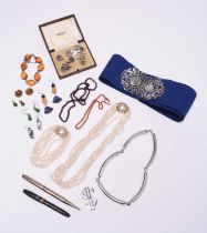 A collection of various pieces of jewellery and costume jewellery