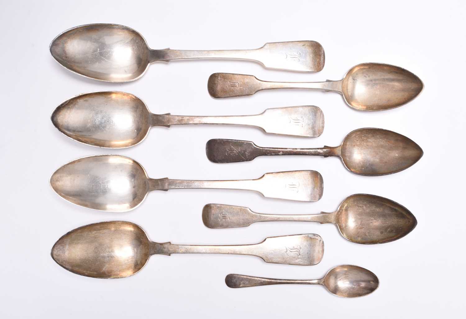 A part set of William IV silver Fiddle pattern flatware