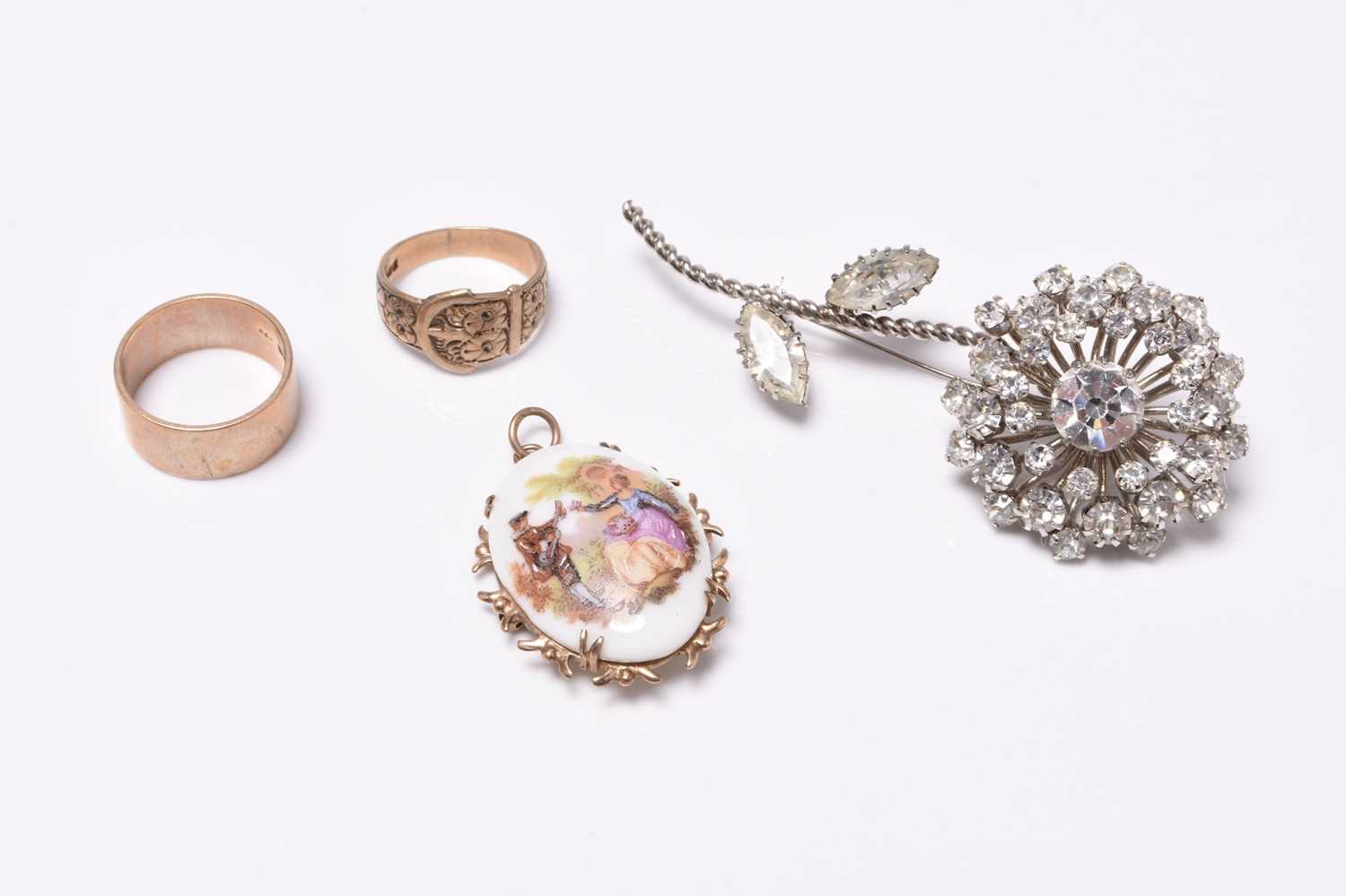 Two rings and two brooches