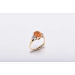 An 18ct gold fire opal and diamond ring