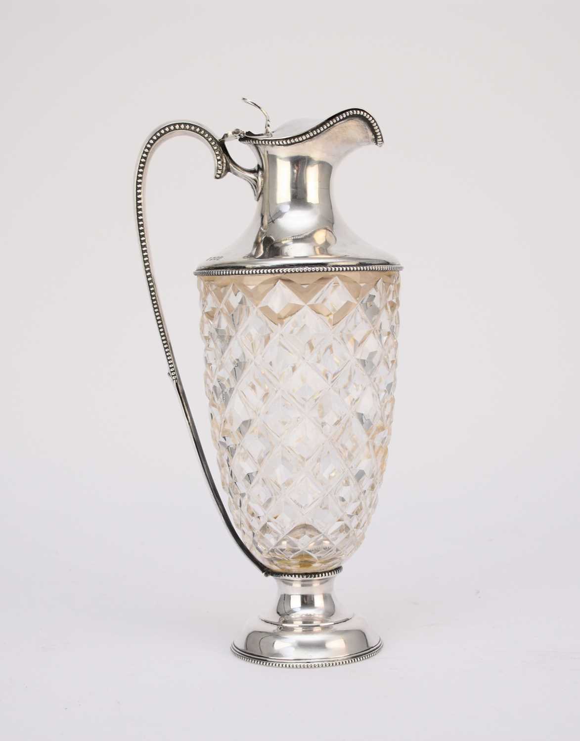 A George V silver mounted wine ewer