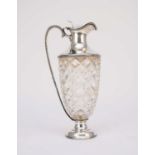 A George V silver mounted wine ewer