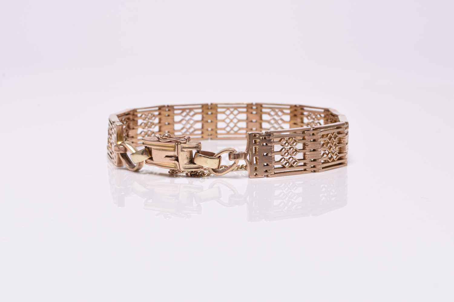 A 9ct rose gold decorative gate link bracelet