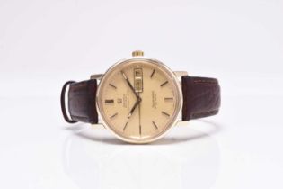 Omega: A gentlemans's gold Seamaster De Ville Tiffany automatic wristwatch
