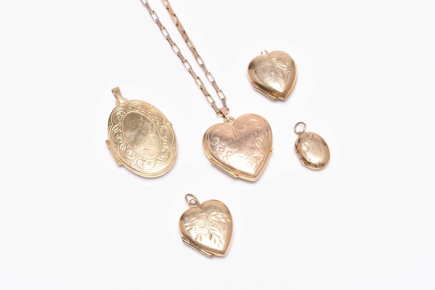 A collection of 9ct gold lockets