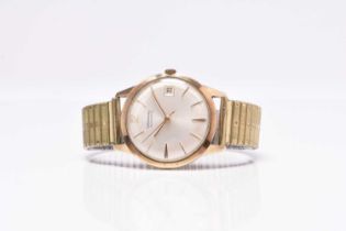 Garrard: A gentleman's 9ct gold automatic wristwatch
