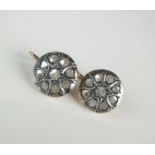 A pair of rose cut diamond circular cluster earrings