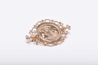 An Elizabeth II half sovereign set brooch