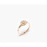 An Edwardian 18ct gold diamond set floral cluster ring