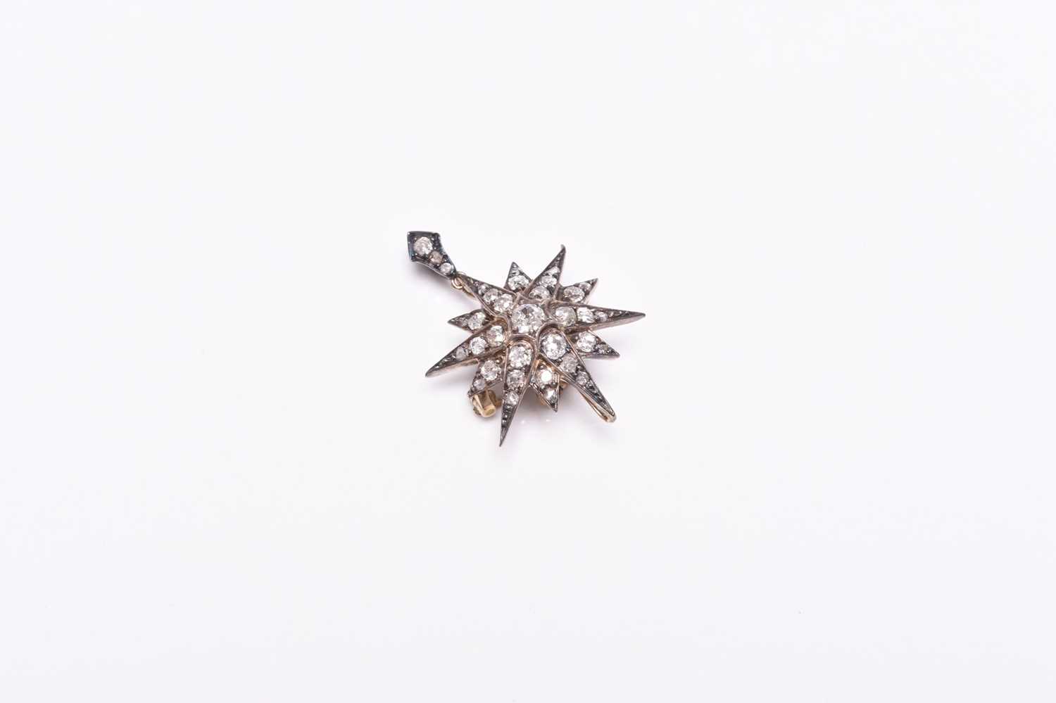 A late 19th century diamond set starburst brooch/pendant