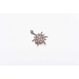 A late 19th century diamond set starburst brooch/pendant