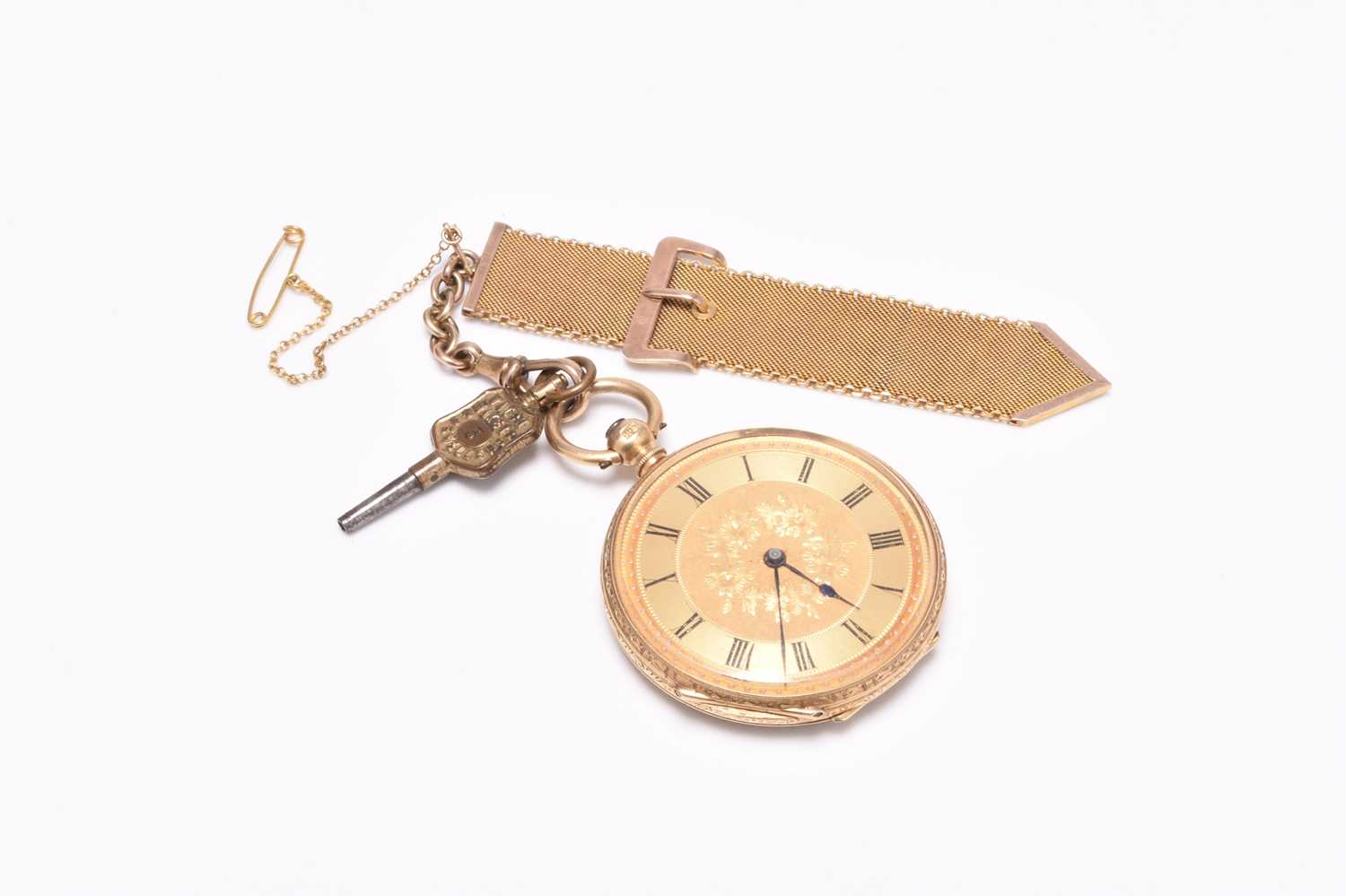 A lady's 18ct gold open face pocket watch, with 9ct mesh fob