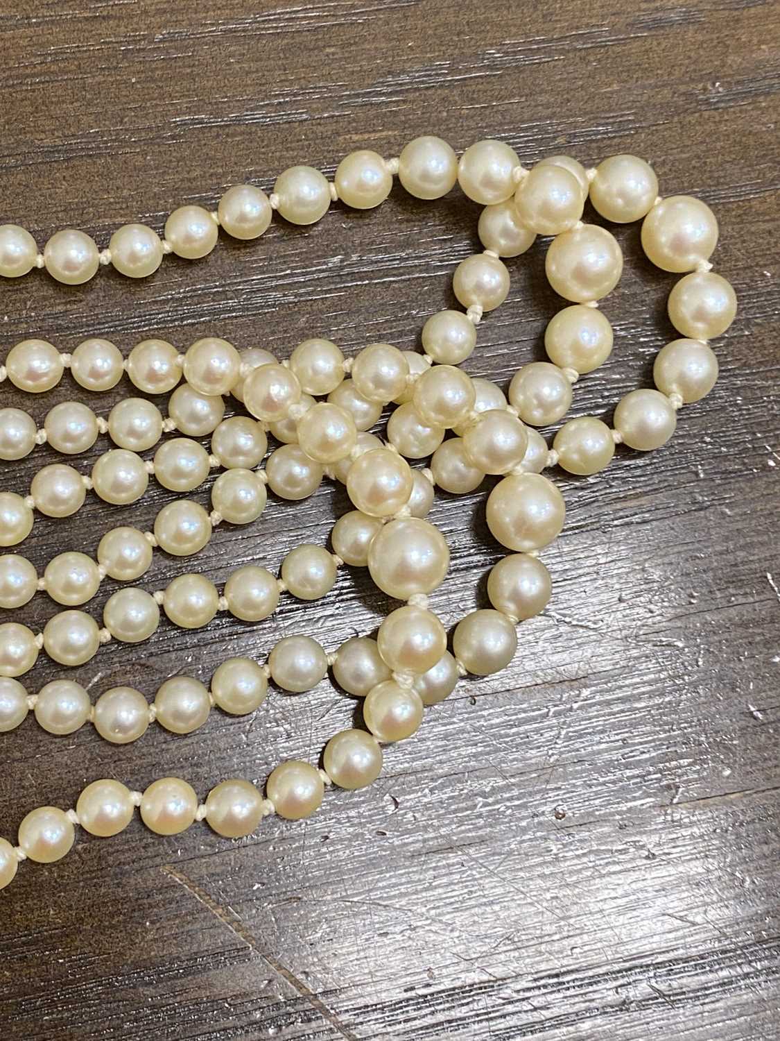 A four strand graduated cultured pearl necklace with 18ct white gold diamond set clasp - Image 6 of 16