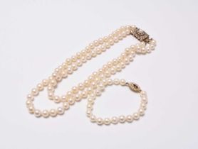 A two strand cultured pearl necklace and a cultured pearl bracelet