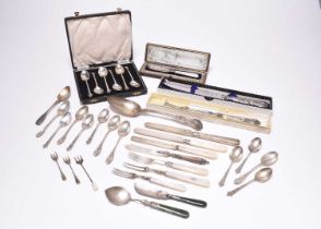 A collection of silver cutlery