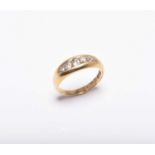 An 18ct gold graduated five stone diamond ring
