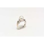 A De Beers 18ct white gold cultured pearl and diamond ring