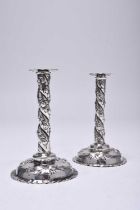 A pair of Victorian silver tapersticks