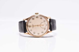 Longines: A gentleman's 9ct gold wristwatch
