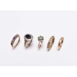 A collection of five 9ct gold rings
