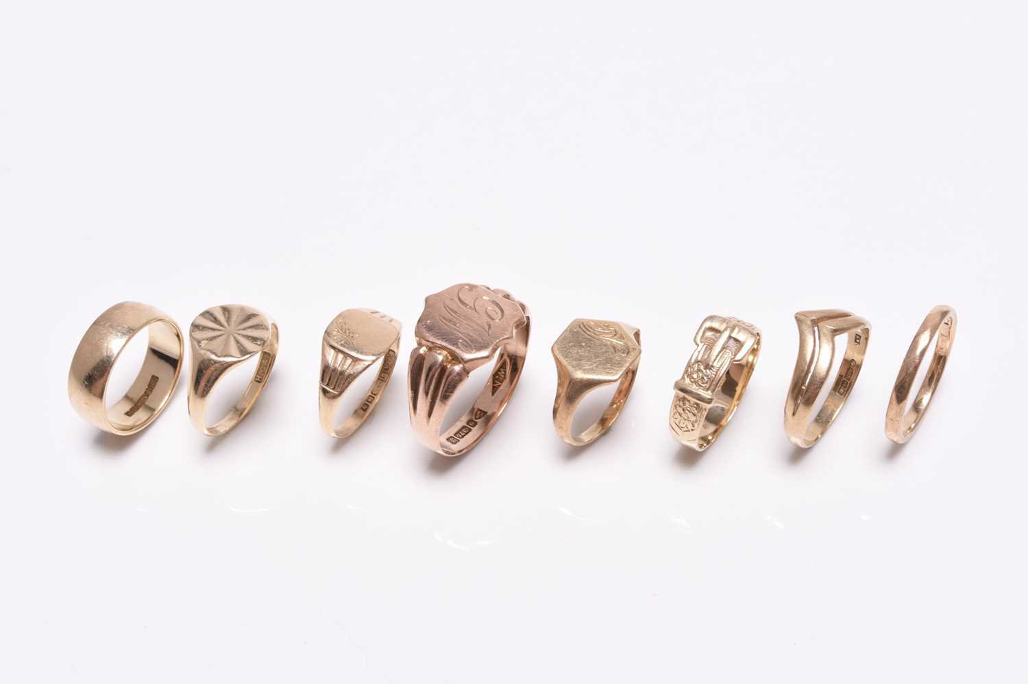 Eight 9ct gold rings