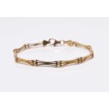 A 9ct gold three bar link bracelet