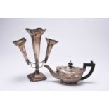 A silver teapot and silver epergne