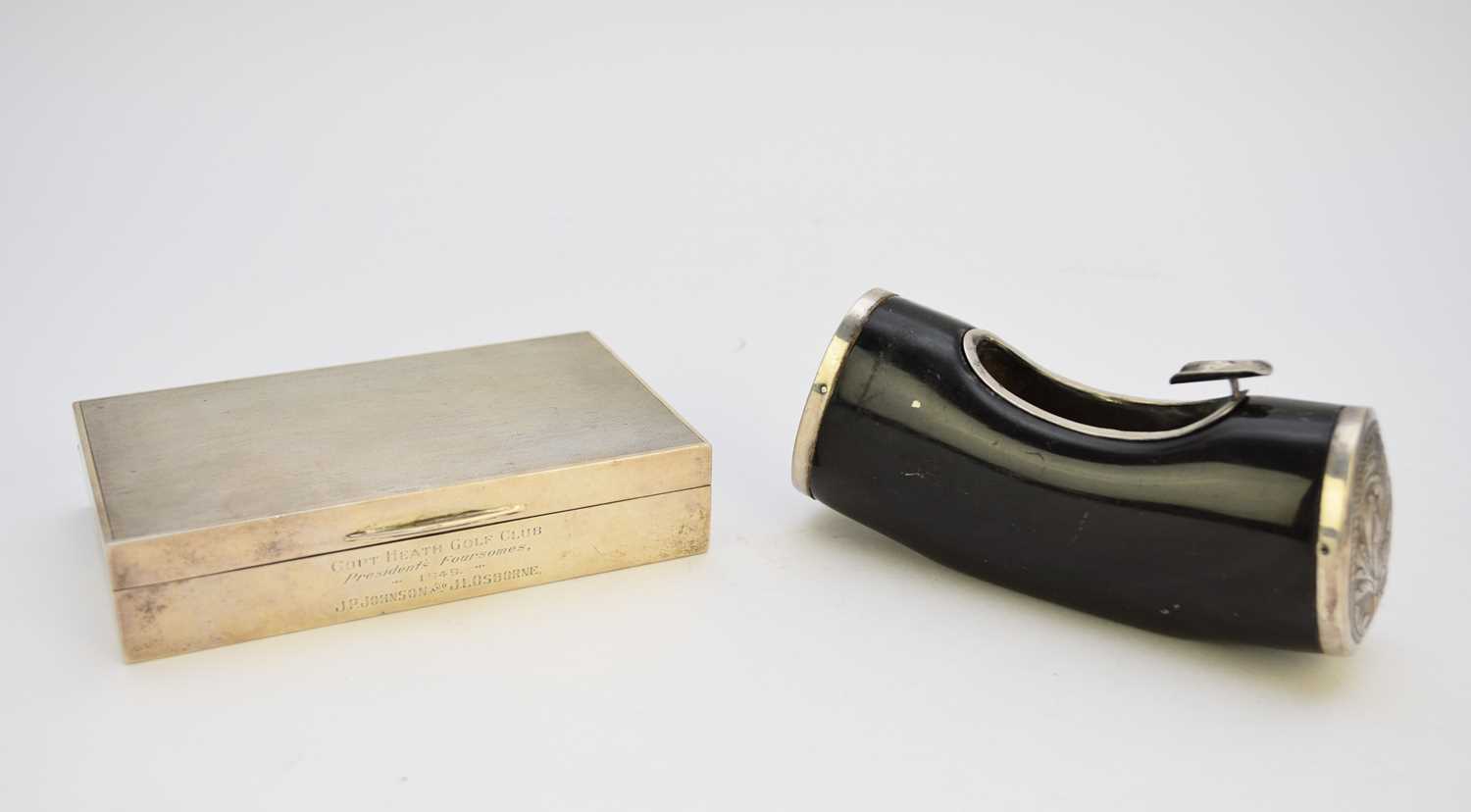 A silver mounted cigarette box and a horn ash tray