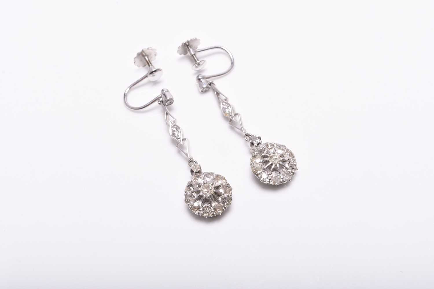 A pair of late 19th century style diamond ear pendants