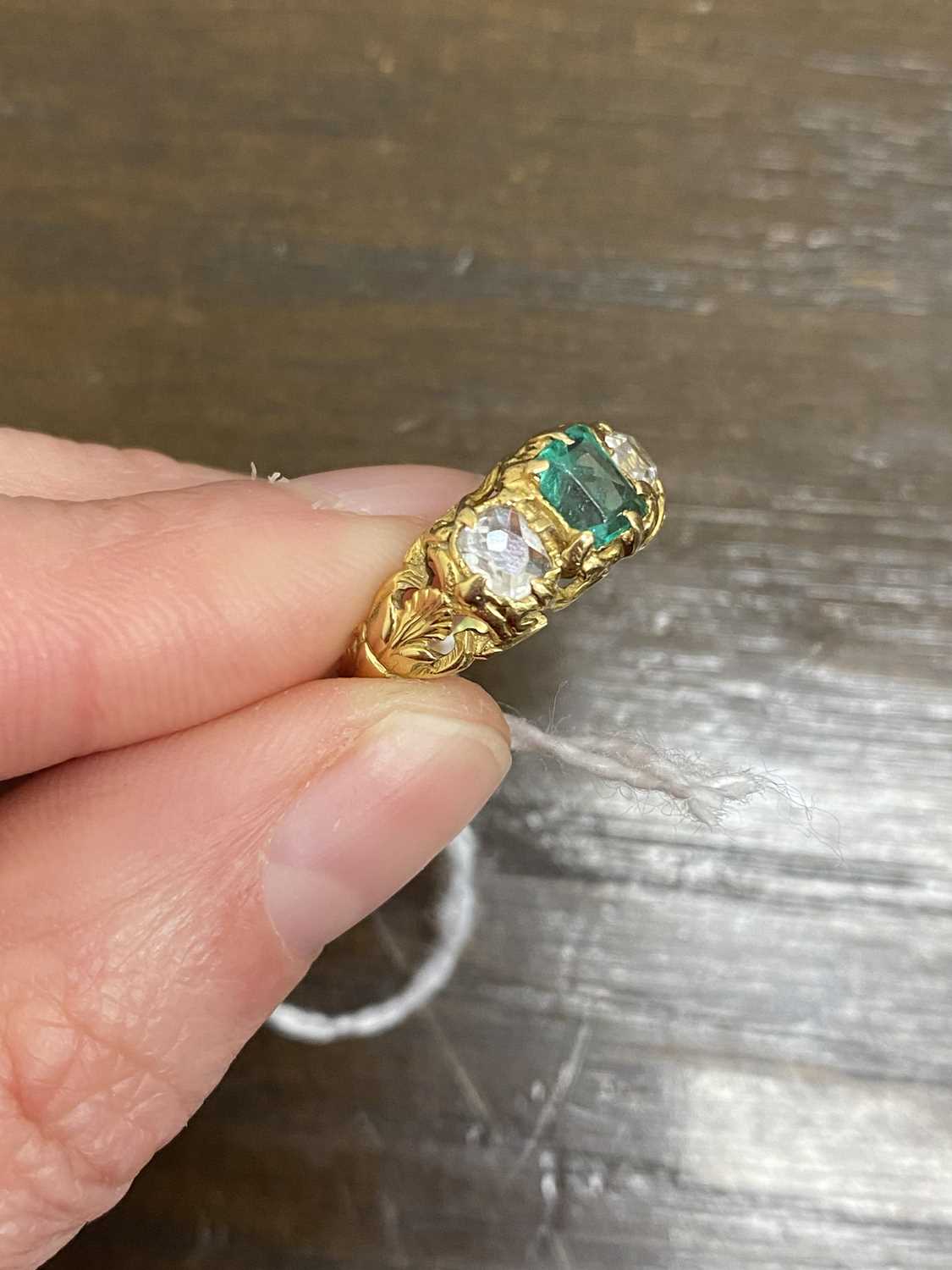A late 19th century three stone emerald and diamond ring - Image 6 of 12