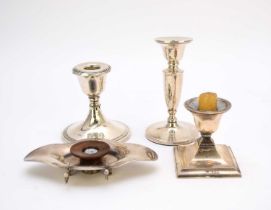 Four silver mounted candlesticks