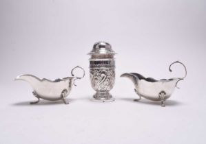 A silver sugar caster and a pair of sauce boats