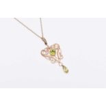 An early 20th century peridot pendant on chain