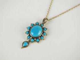 A turquoise and split pearl pendant on chain