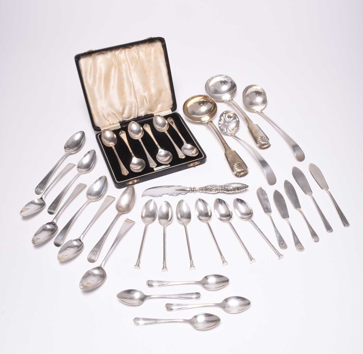 A collection of silver flatware