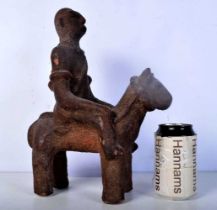 An African Dogon terracotta Equestrian figure 32 x 25 cm.