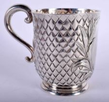 A Victorian Silver Tankard by Edward Ker Reid Hallmarked London 1865. 9.5cm x 12cm x 8.5cm, weight