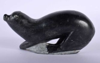 A NORTH AMERICAN INUIT CARVED STONE SEAL. 407 grams. 12.5 cm x 6 cm.